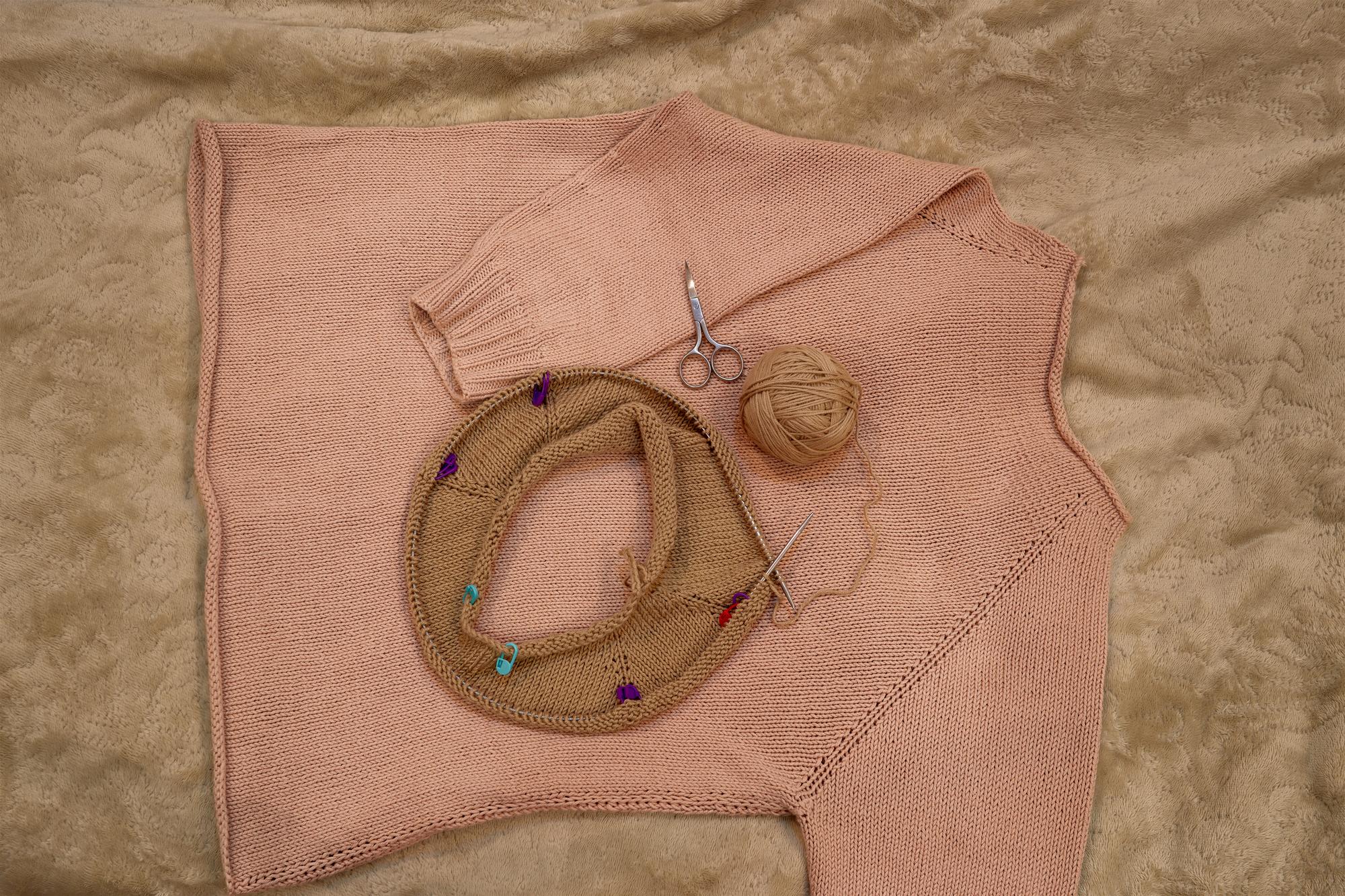 sample scaled embroidery mockup pinned on kraft paper